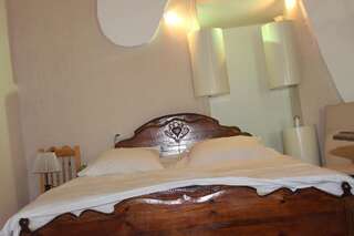 Хостелы Villa Gabliani Местиа Односпальная кровать в общем номере-11